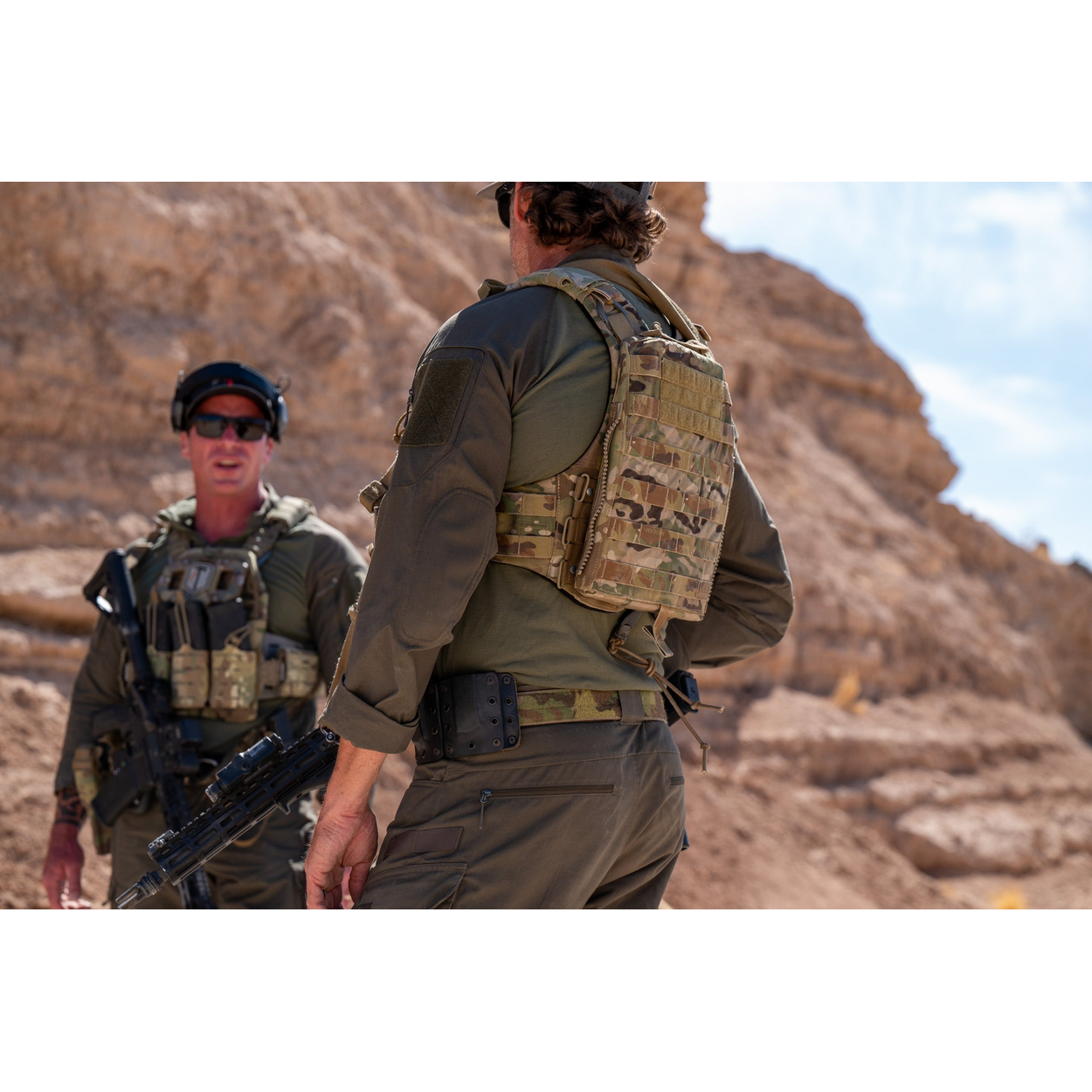 Two men wearing the Tomahawk Performance HW / Combat Uniform in a desert canyon.