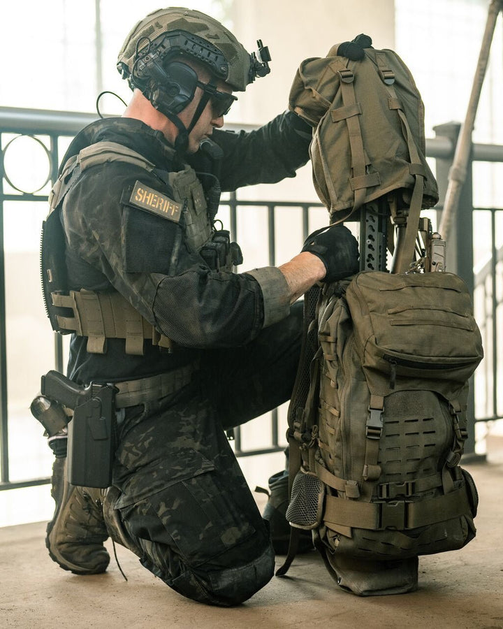 Eberlestock G2 Gunslinger II tactical rifle pack in use - lifestyle photo