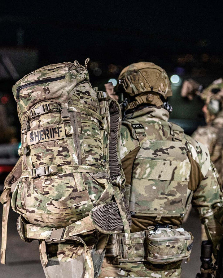 Eberlestock G2 Gunslinger II tactical rifle pack in use - lifestyle photo