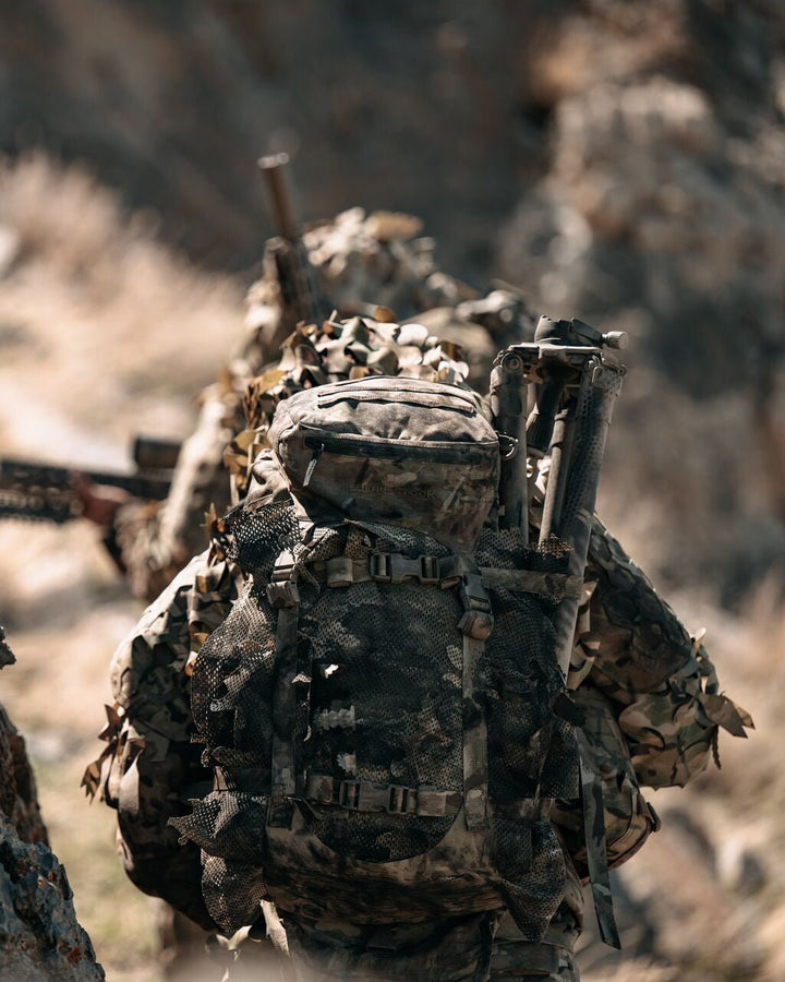 Eberlestock G2 Gunslinger II tactical rifle pack in use - lifestyle photo