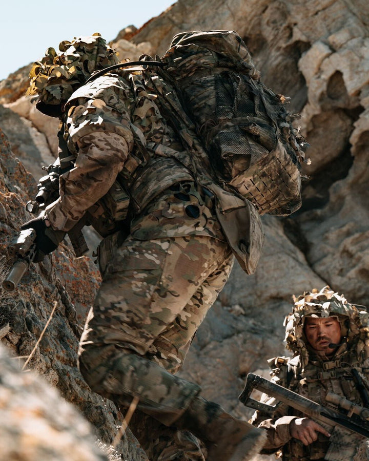 Eberlestock G2 Gunslinger II tactical rifle pack in use - lifestyle photo
