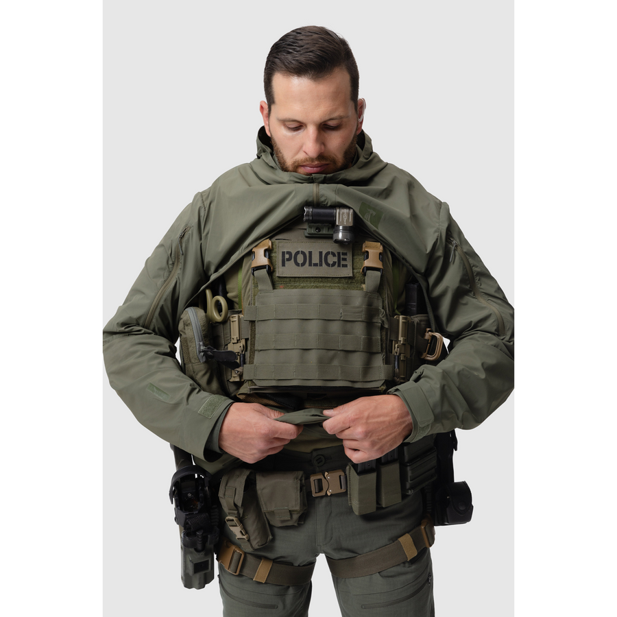 Frontal photo of the Tomahawk Performance Overlayer Anorak, tactical urban or military use weather protective layer, in the Ranger Green color way. Reverse-U zip is shown open to access a carrier.
