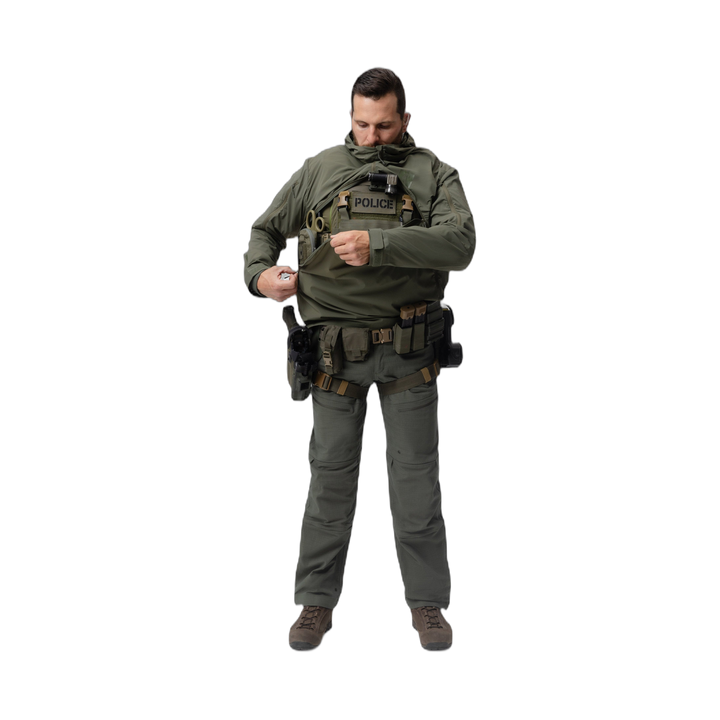 Frontal photo of the Tomahawk Performance Overlayer Anorak, tactical urban or military use weather protective layer, in the Ranger Green color way. Reverse-U zip shown being closed over a carrier.
